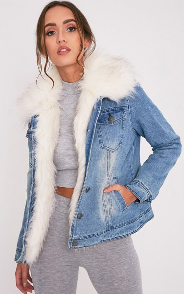 blue fur lined denim jacket with gray jogging trousers at the top