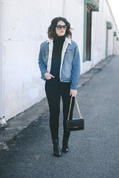 blue denim sherpa lined jacket with all black outfit