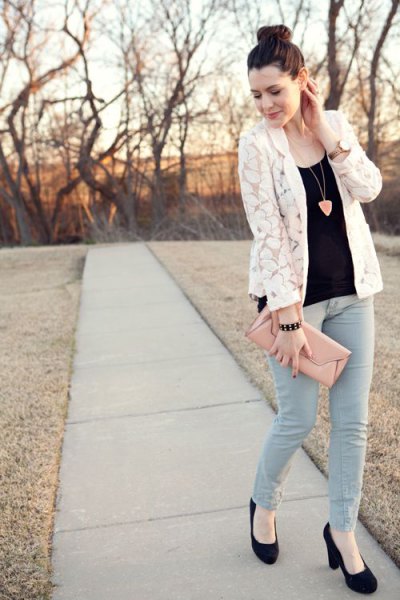 white lace jacket with black vest top gray skinny pants