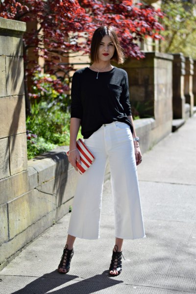 black casual fit sweater with white culottes