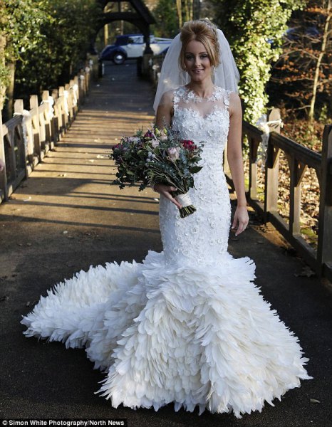 white feather mermaid wedding dress