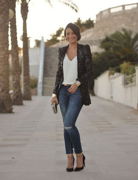 black sequin blazer with white v-neck jeans