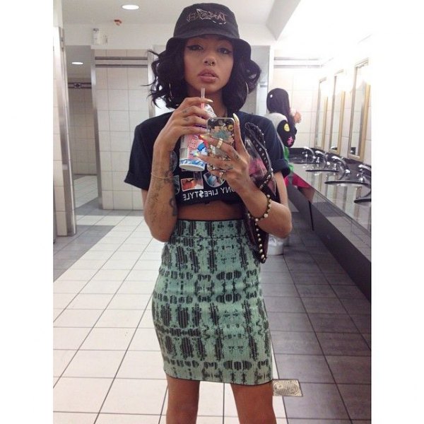 bucket hat with black cropped tee white printed pencil skirt