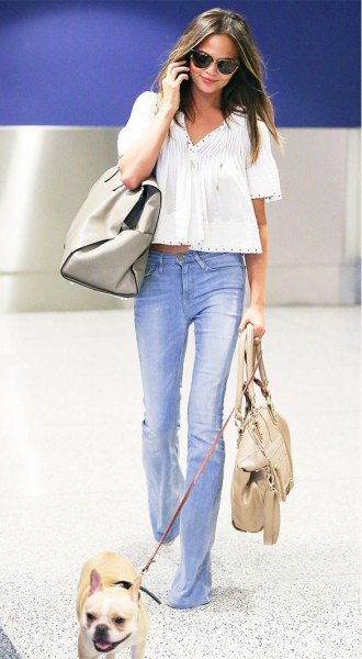 white cropped peasant top with light blue puffed jeans