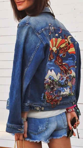 blue embroidered jacket with mini denim shorts