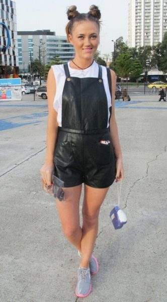 white sleeveless top black leather overall shorts