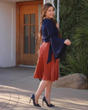 red pleated skirt navy bell sleeve blouse