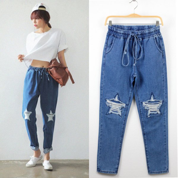 white cropped tee ripped baggy jeans