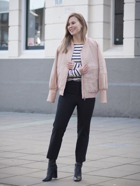 pink jacket black and white striped tee