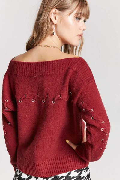 red sweater with boat neck lace details
