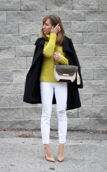 yellow chunky knitted sweater black wool coat