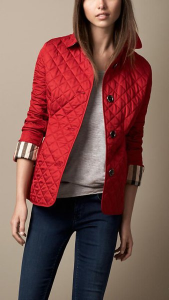 red quilted jacket dark blue skinny jeans