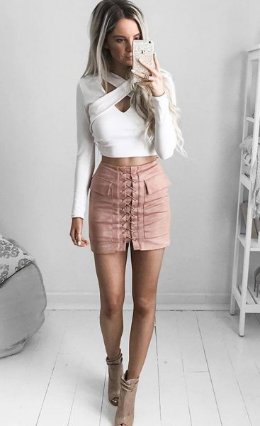 white criss cross front crop top pink lace up mini skirt