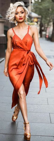 red satin wrap dress gold heels