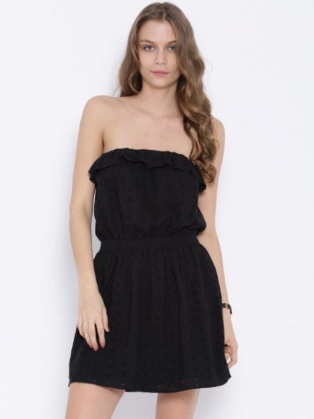 black folded overall waist dress at the waist
