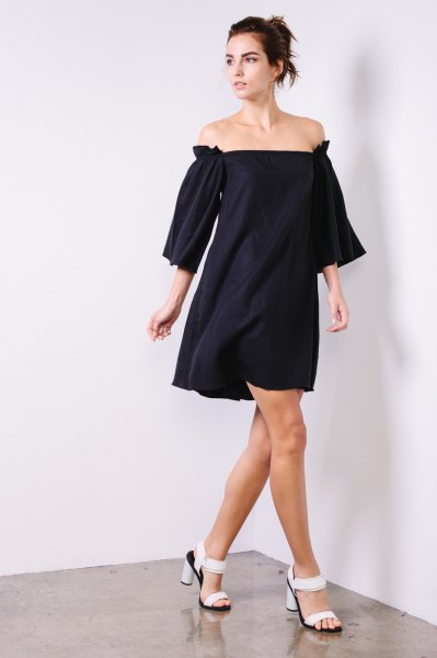 black dress with gathered sleeves