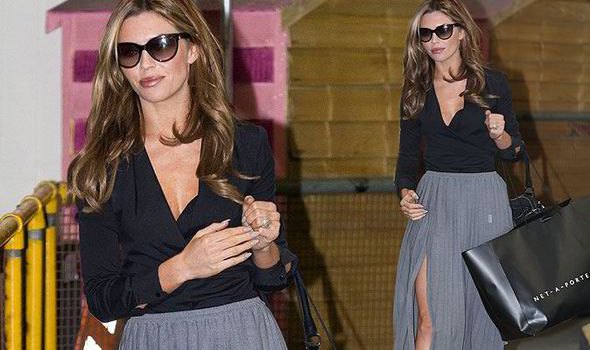 abbey clancy black wrap top gray maxi pleated skirt