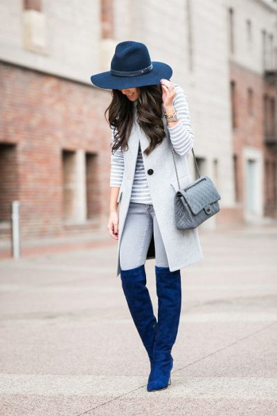navy blue felt hat that matches knee high suede shoes