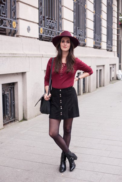 red lace up top black button front skirt