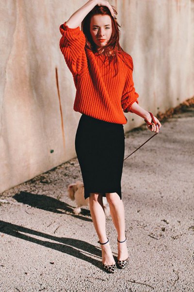 red oversized knitted sweater black pencil skirt