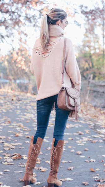 white sweater with high lace suude boots
