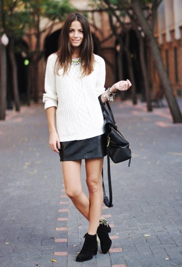 white knitted sweater black leather mini skirt in winter