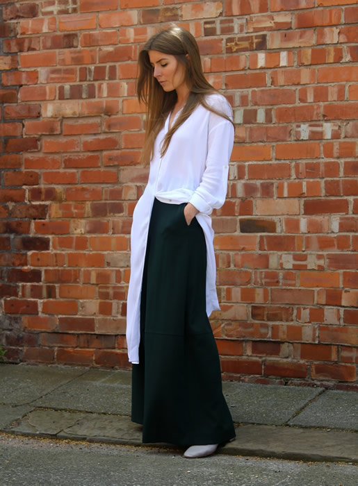 white long sweater with wide leg trousers