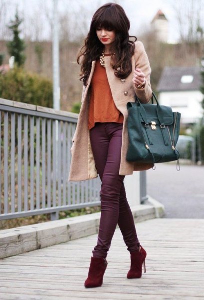light pink wool coat with purple skinny jeans