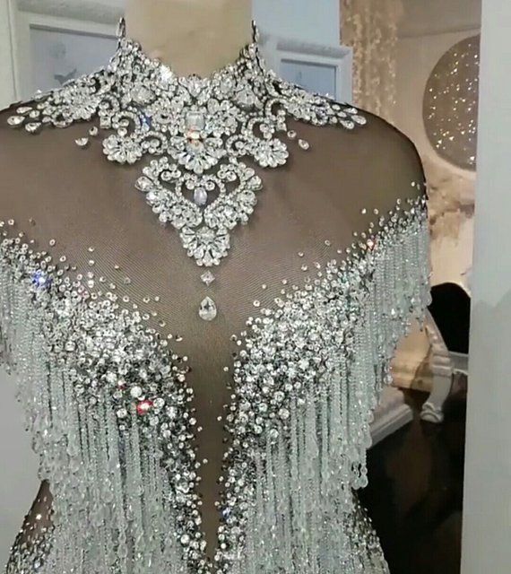 Couture Swarovski crystals beaded fringe embroidered dress .