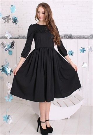 Modest black midi dress with sleeves coming soon to Mode-sty .