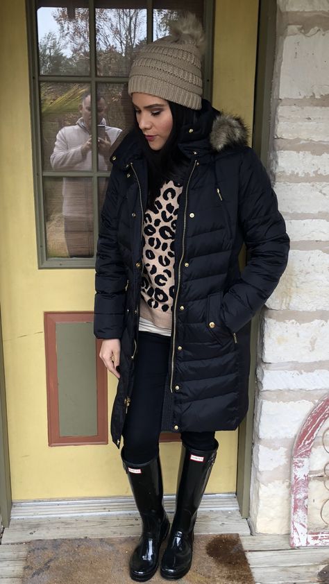Winter outfit ideas black long puffer jacket fur hood Michael Kors .