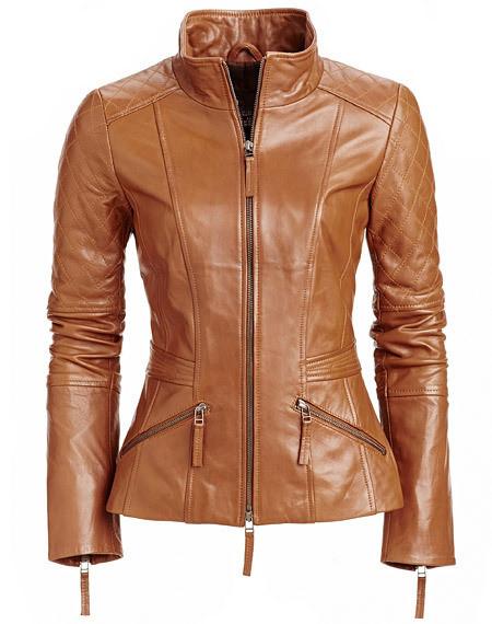 Women's stylish tan brown leather jacket with quilted patches .