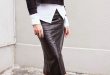 black leather skirt, white button-down (not tucked in), black .
