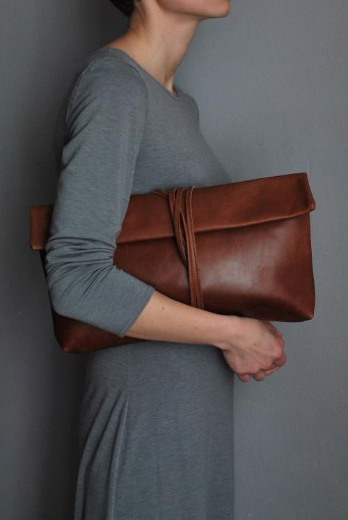 Gray dress + brown leather purse. clothing women apparel .
