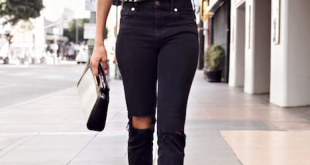 Floral top blouse black ripped jeans heels purse. Street spring .