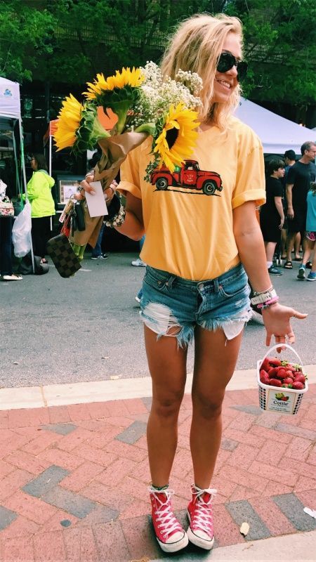 yellow tee and ripped jean shorts with red converse. Visit Daily .