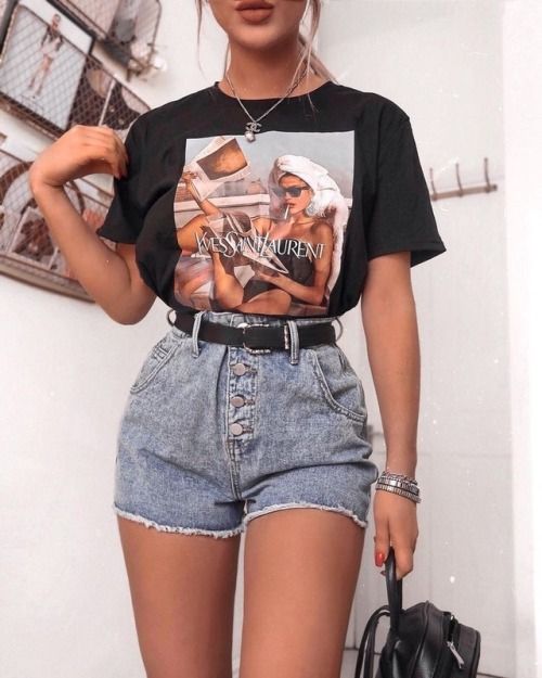 High waisted shorts, black belt, black bag, cool tee tucked in .