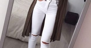 This classic white ripped skinny jeans is styled with distressed .