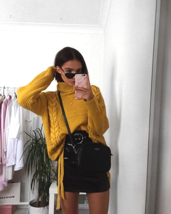 yellow-sweater-leather-skirt-outfit-cozy-new-years-eve-outfit .